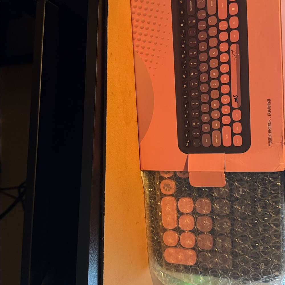 Logitech Wireless Keyboard in Black and Coral